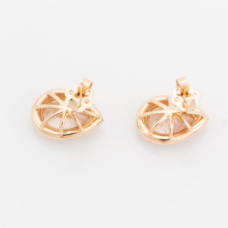 Pear shaped morganite and brilliant cut diamond earrings.