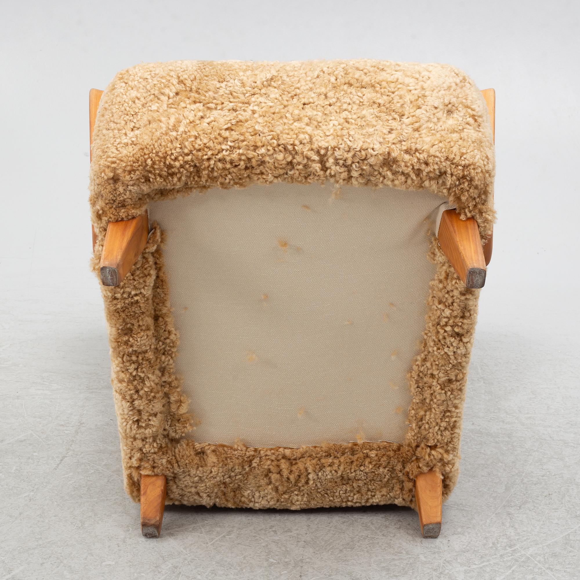 Fåtölj med fotpall, 1900-talets första hälft.