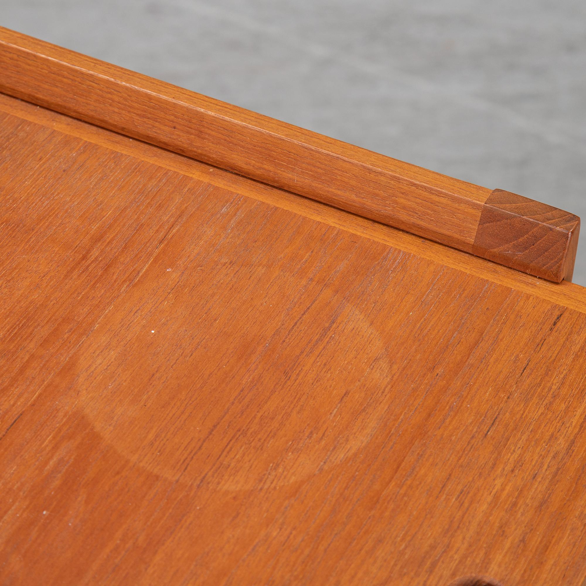 a mid 20th century teak serving trolley.