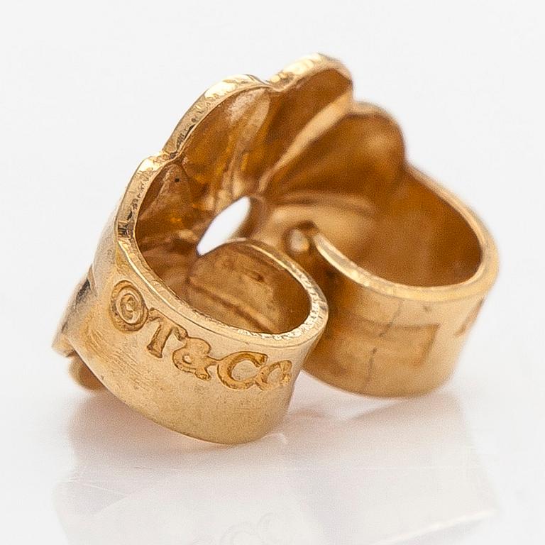 Tiffany & Co, Paloma Picasso, "Melody" hoop earrings in 18K gold.