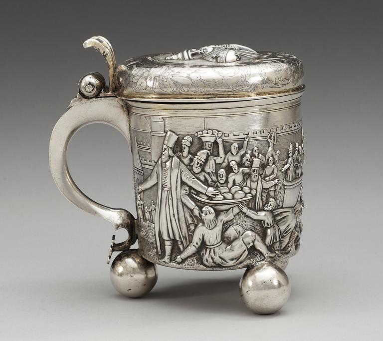 A German 18th century parcel-gilt tankard, makers mark of Batholome Wilckens, Hamburg ca 1700. Russian motif.