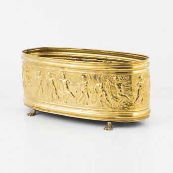 A brass jardiniere, circa 1900.