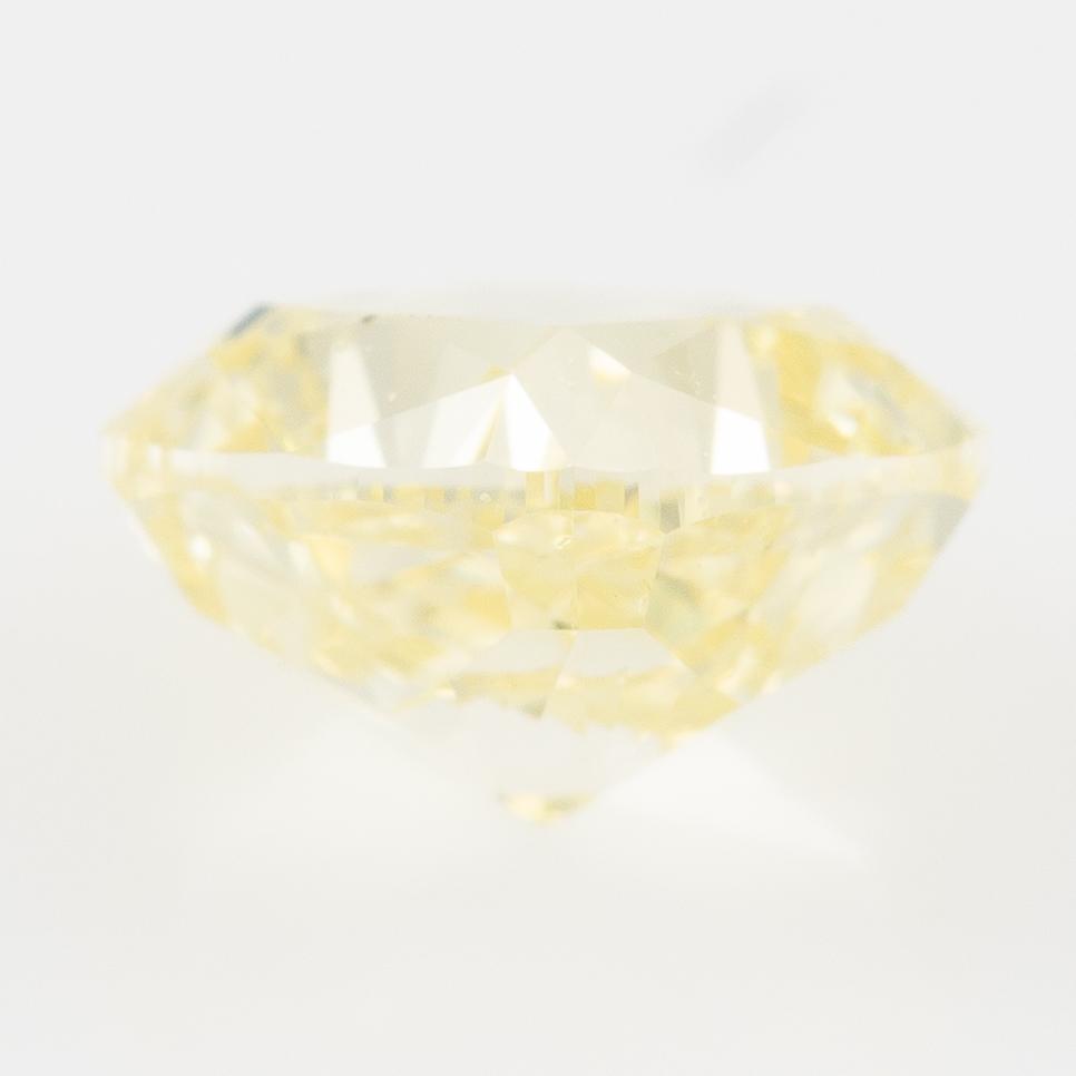 Cushionformad gul diamant, 0.58 ct, medföljande GIA report.