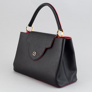Louis Vuitton, a 'Capucines MM' Taurillon leather, 2015.