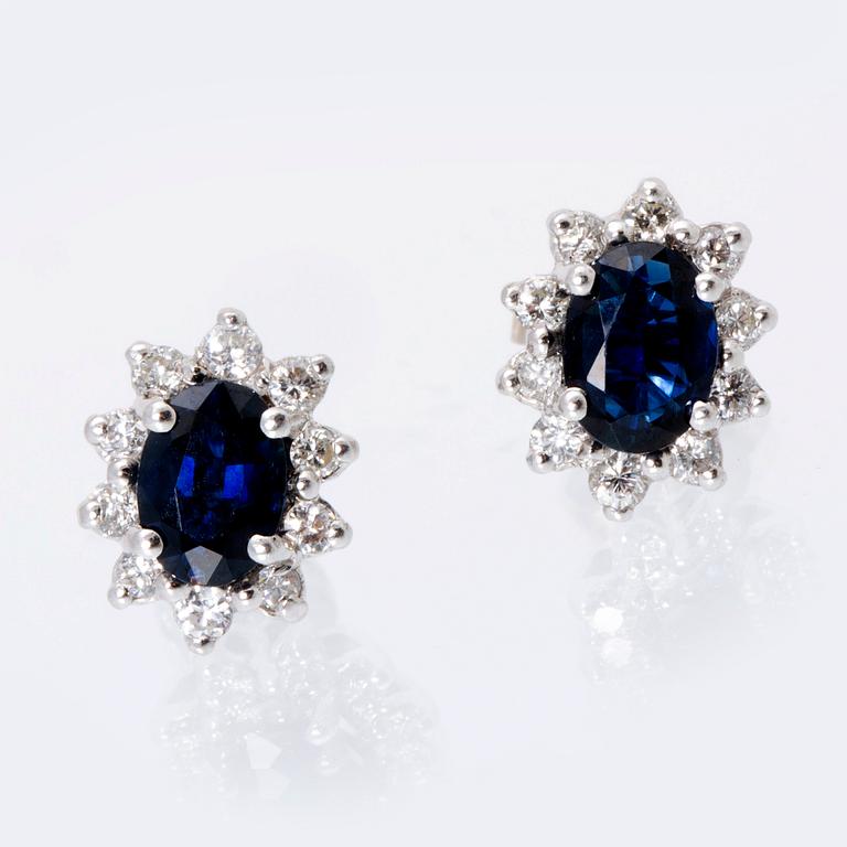 Earrings 18K whitegold 2 sapphires approx 7 x 5 mm and brilliant-cut diamonds approx 0,40 ct in total, Detters Juveler.