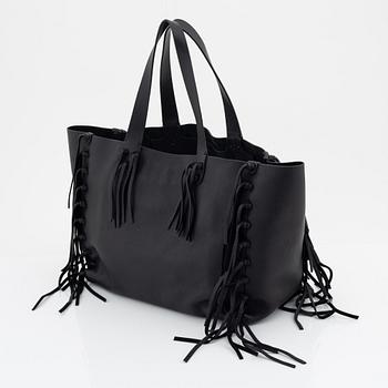 Valentino Garavani, a black leather fringe bag.