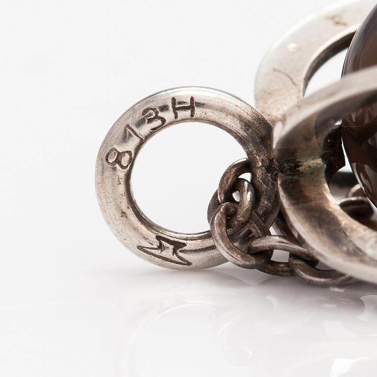 Elis Kauppi, A silver necklace with a smoaky quartz. Kupittaan kulta, Turku.