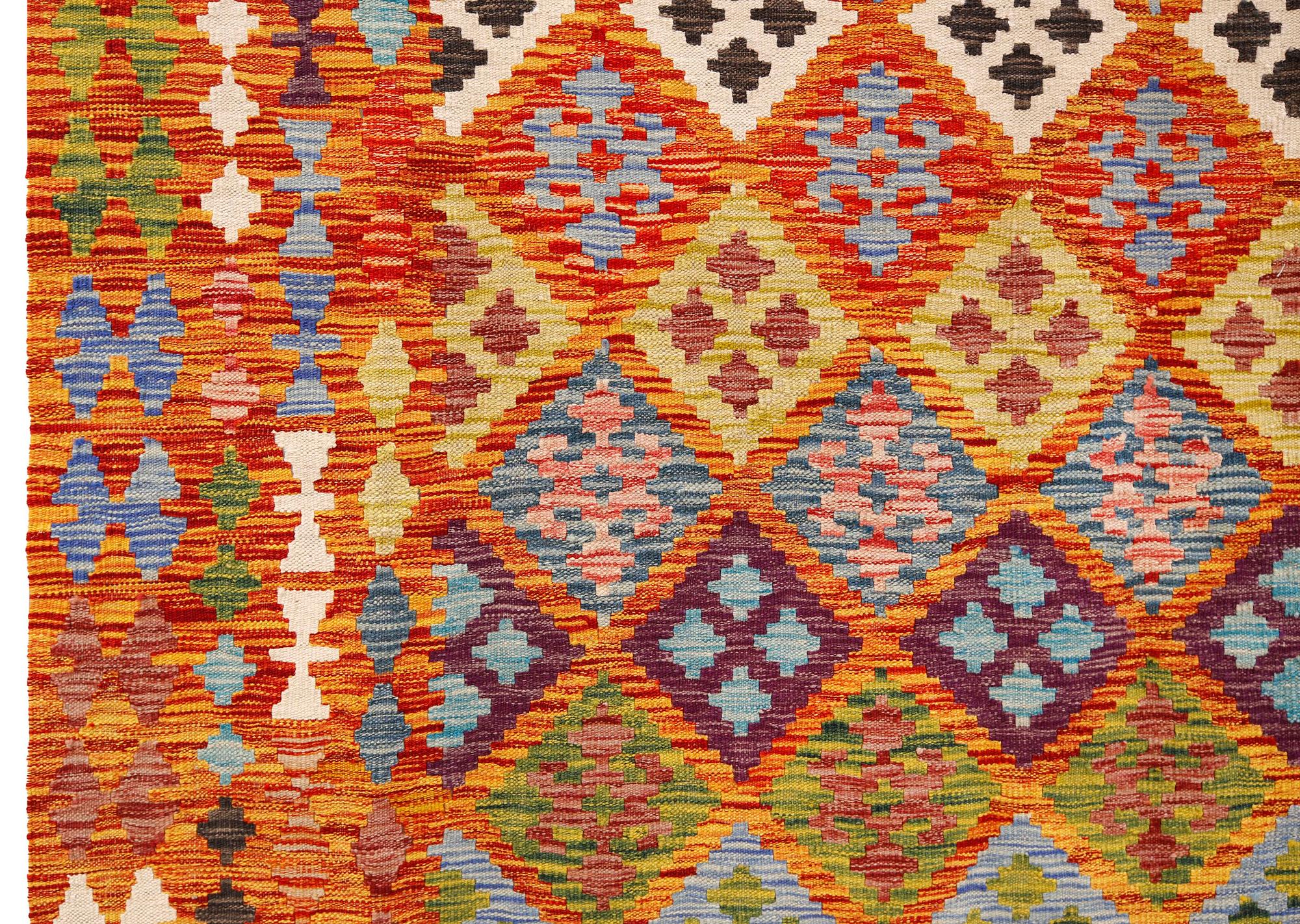 A kilim carpet, approximately 351 x 254 cm.