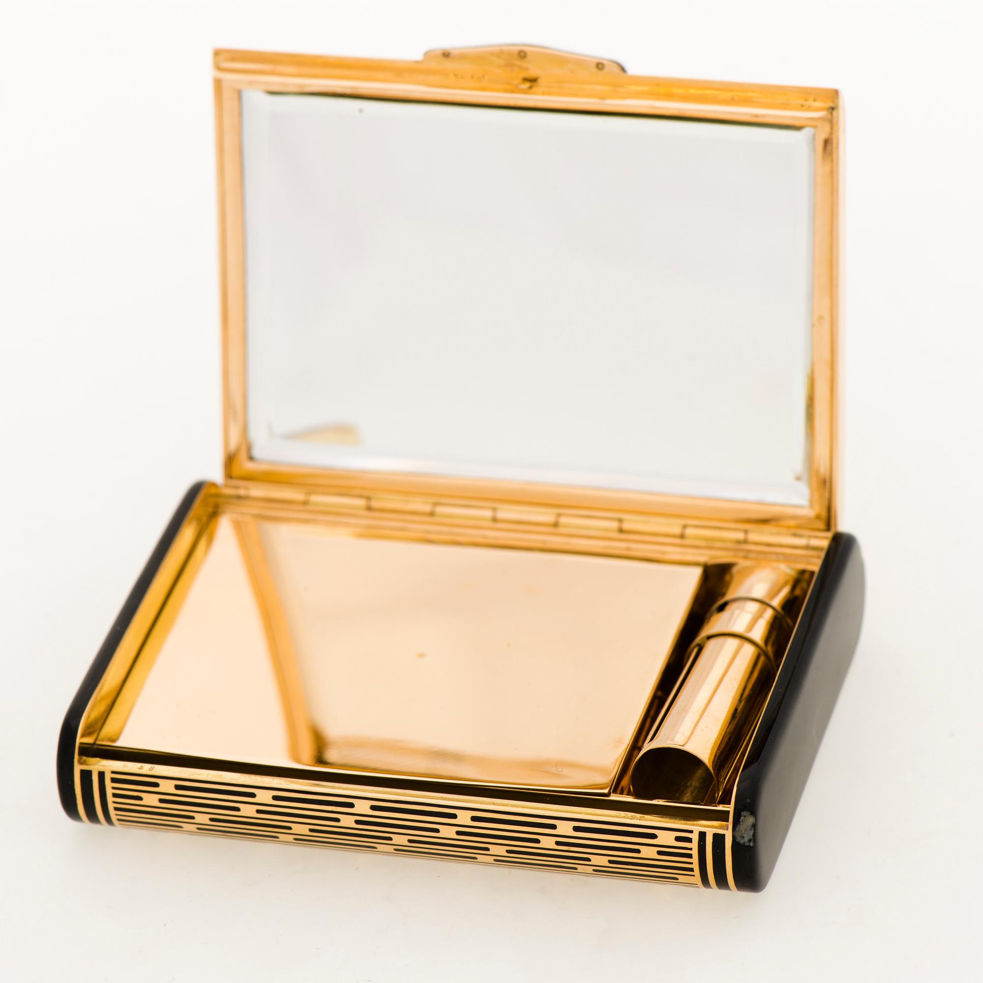A CARTIER VANITY CASE, 18K gold, enamel, rose cut diamonds. 1930s.