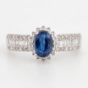 Kyanite and brilliant-cut diamond ring.