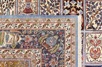 A Figural Sarouk carpet, c. 348 x 240 cm.