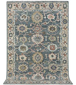 An oriental carpet with Mamluk design, ca. 278 x 188 cm.