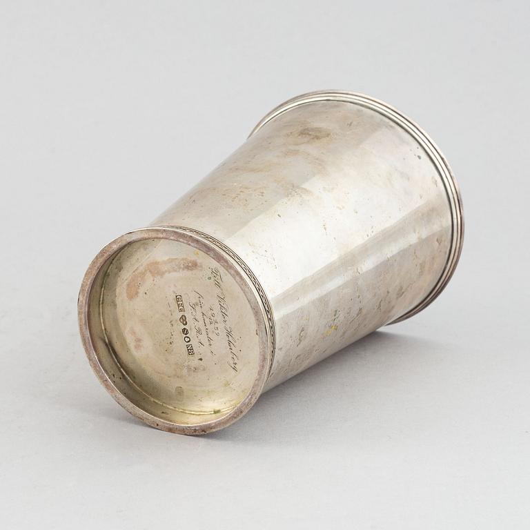 A silver beaker by C.F. Carlman, an inscription underneath, dated 1939.