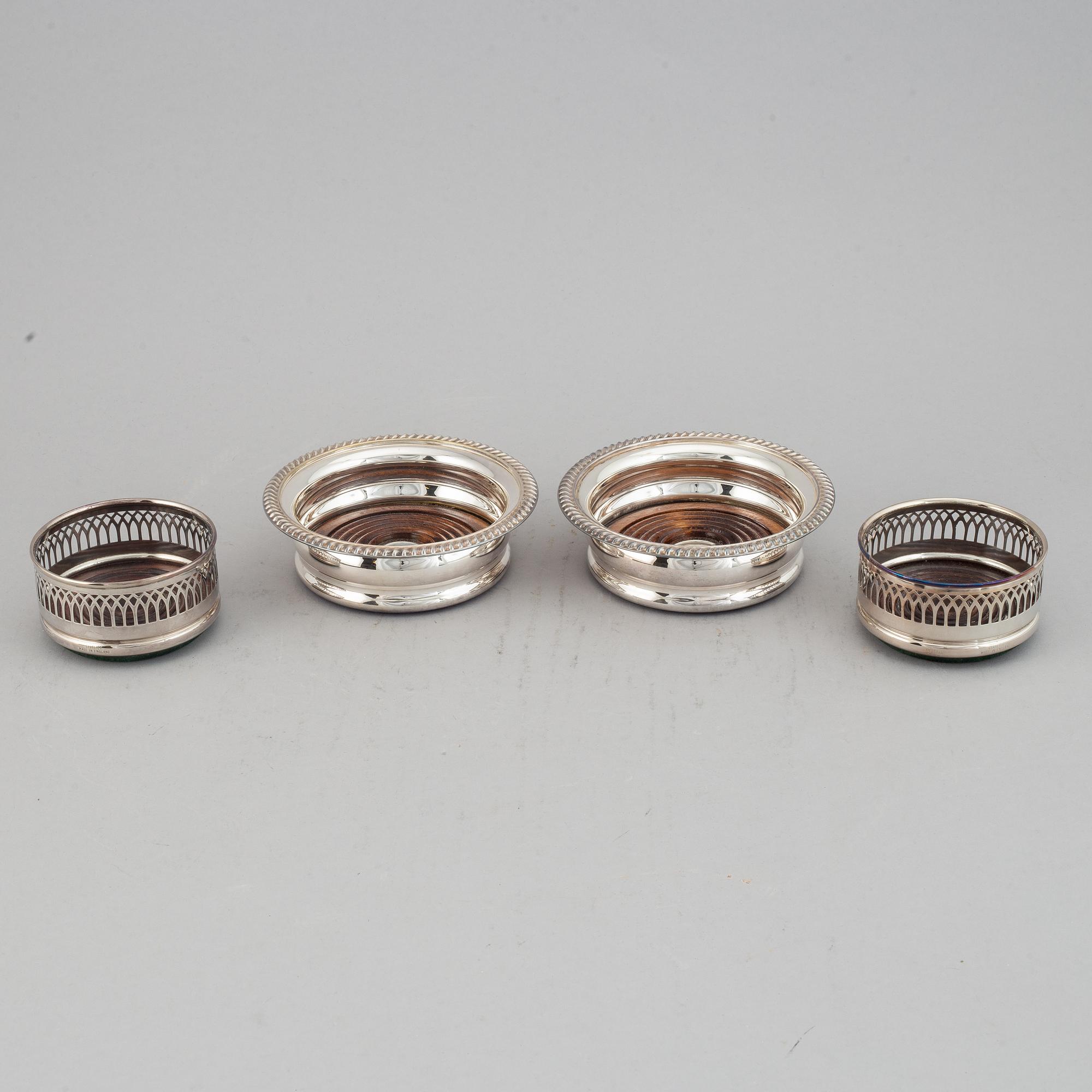 Coasters, two pairs, silver plate, England.