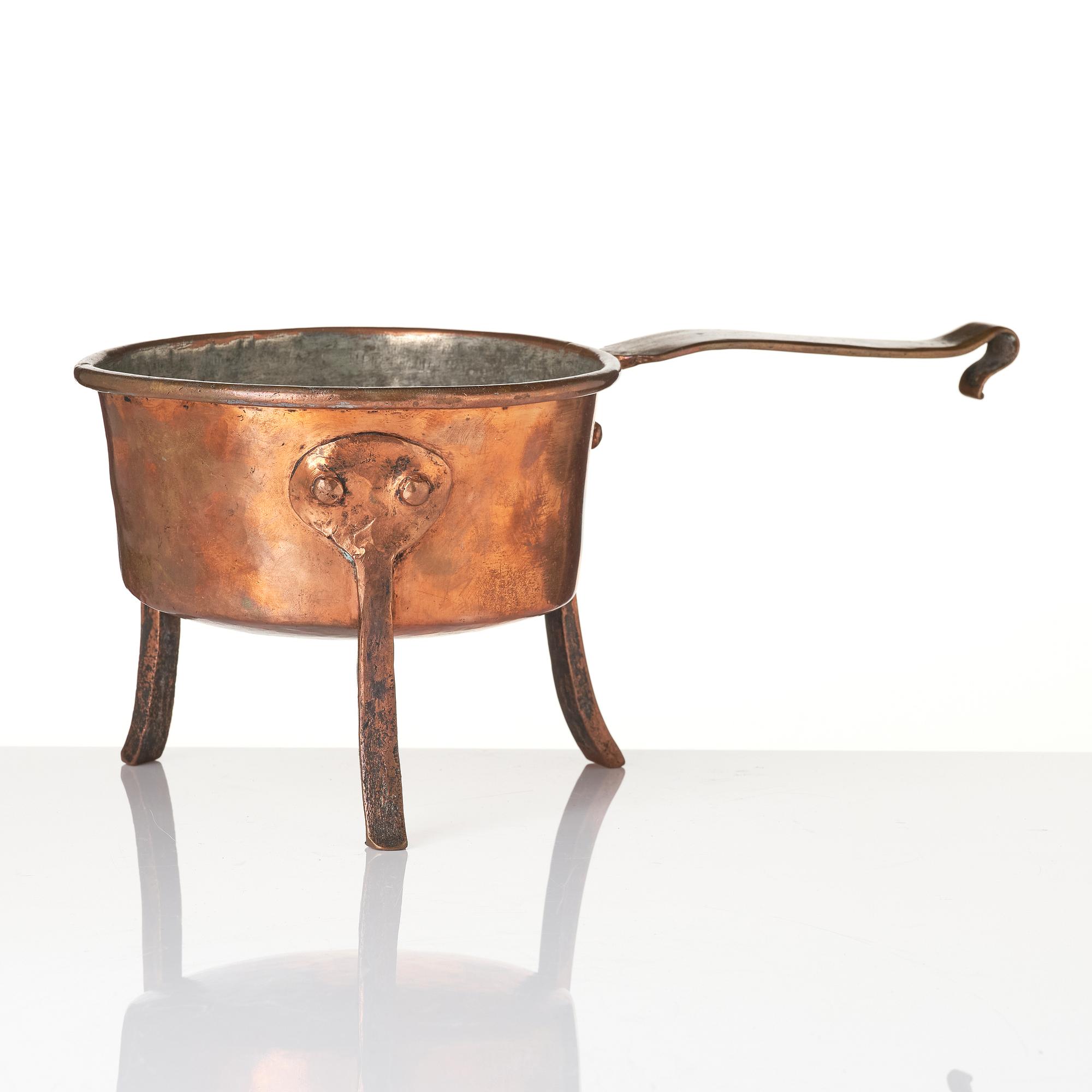 A copper saucepan, 18th century.