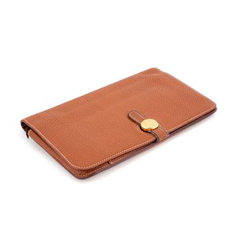 HERMÈS, a brown leather wallet, "Dogon Dou".
