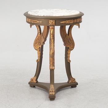 A pair of chairs and a side table, second half of the 20th century. Empire style.