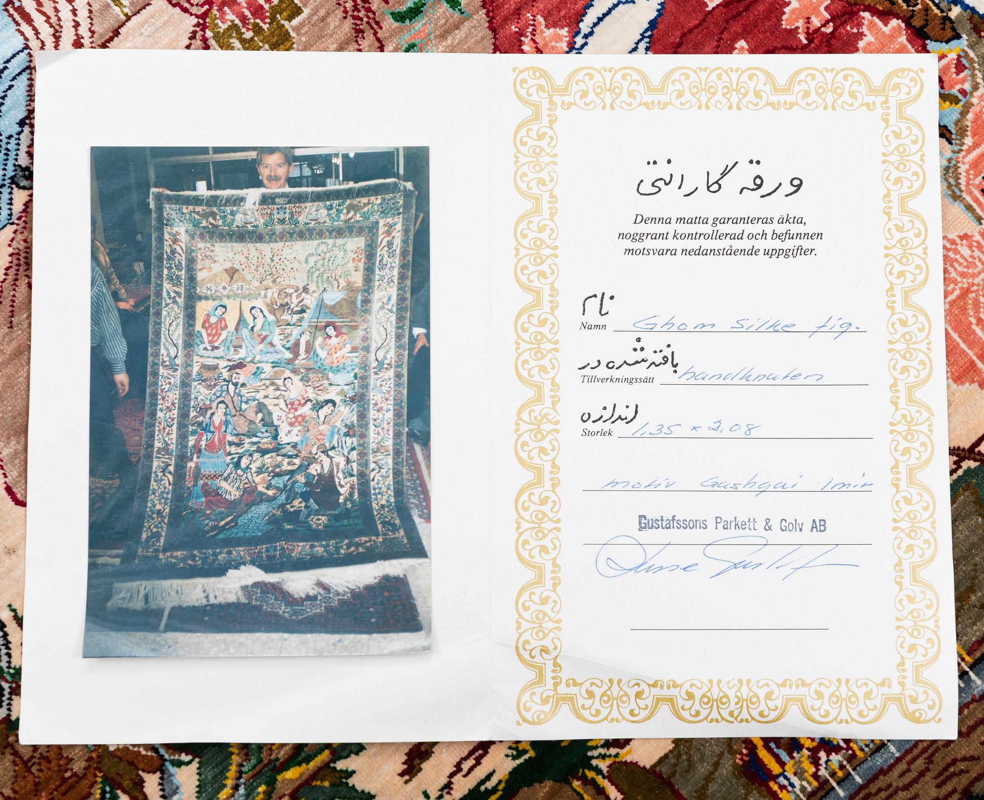 A silk Qum rug, Central Persia, signed, c. 135 x 208 cm.