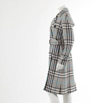 BURBERRY, a wool trenchcoat.