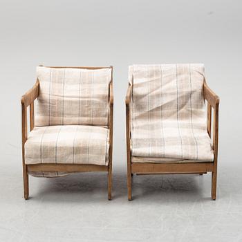 A pair of pine armchairs attributed to Carl Westman, early 20th Century.