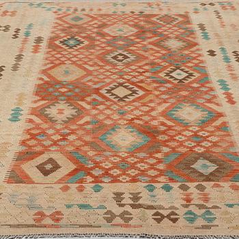 a carpet, kilim, around 298 x 196 cm.