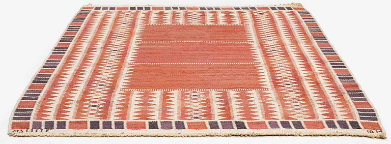 Barbro Nilsson, a carpet, 'Salerno röd', flat weave, c. 214 x 158 cm, signed AB MMF BN.