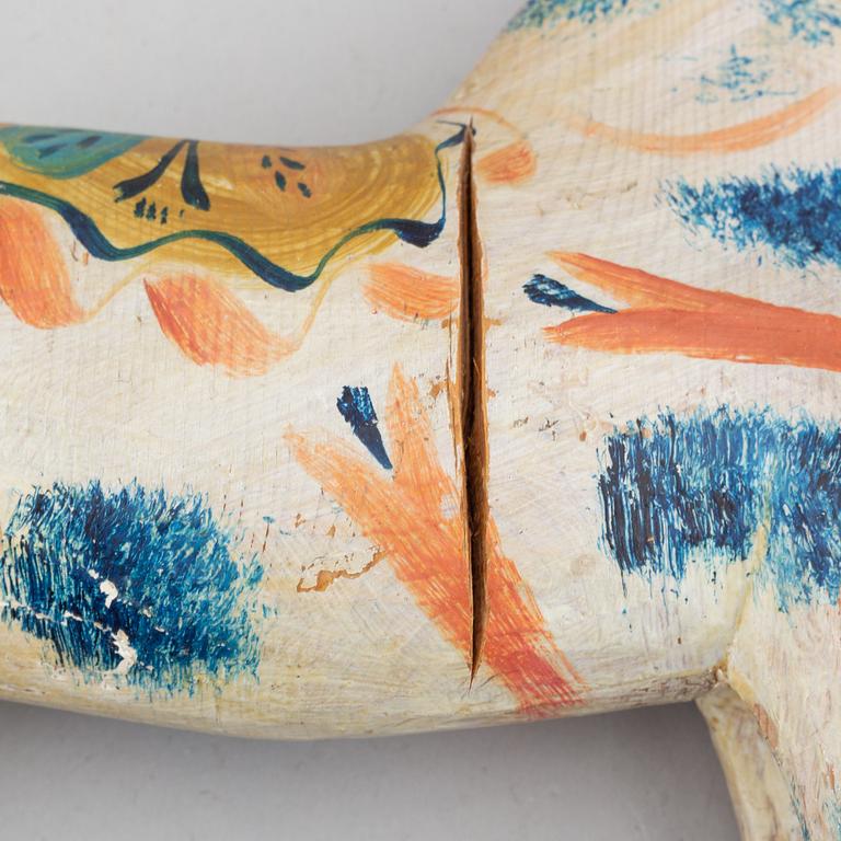 A wooden carved and painted 'Dalahäst', early or mid 20th century.