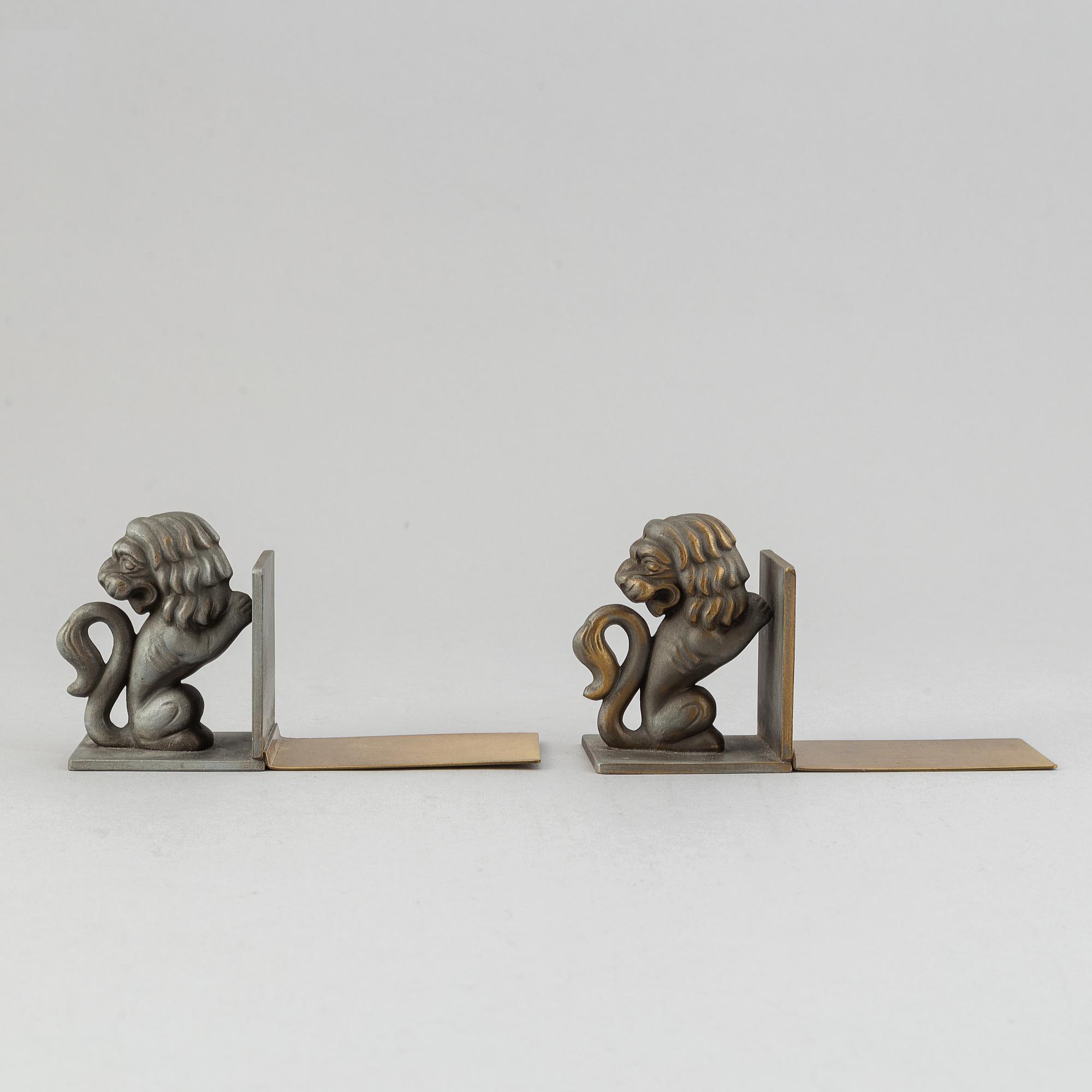 A pair of brass book ends, Stjärnmetall, 1930's.