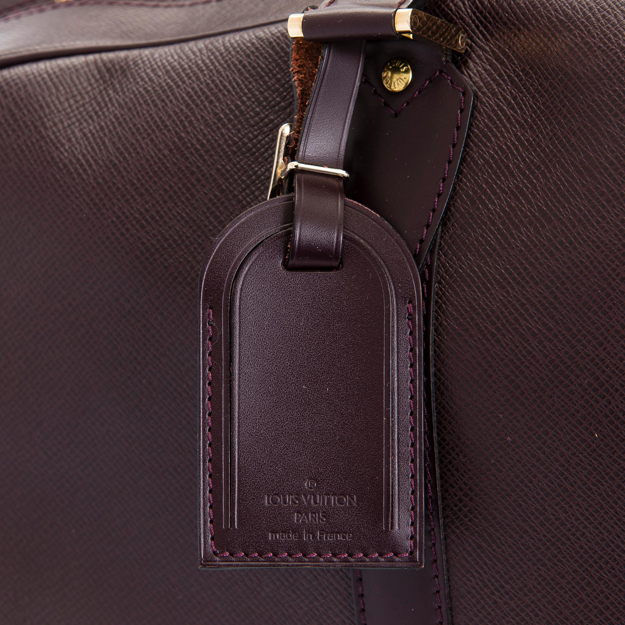 Louis Vuitton, a 'Taiga Kendall PM' weekend bag.