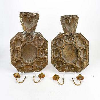 A parr of Baroque style brass wall sconces.