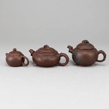 A group of three yixing pots, 20th century.