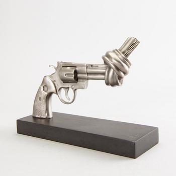Carl-Fredrik Reuterswärd/ The Non-Violence Project Foundation, a signed and numbered sculpture 55/150 in humanium metal.
