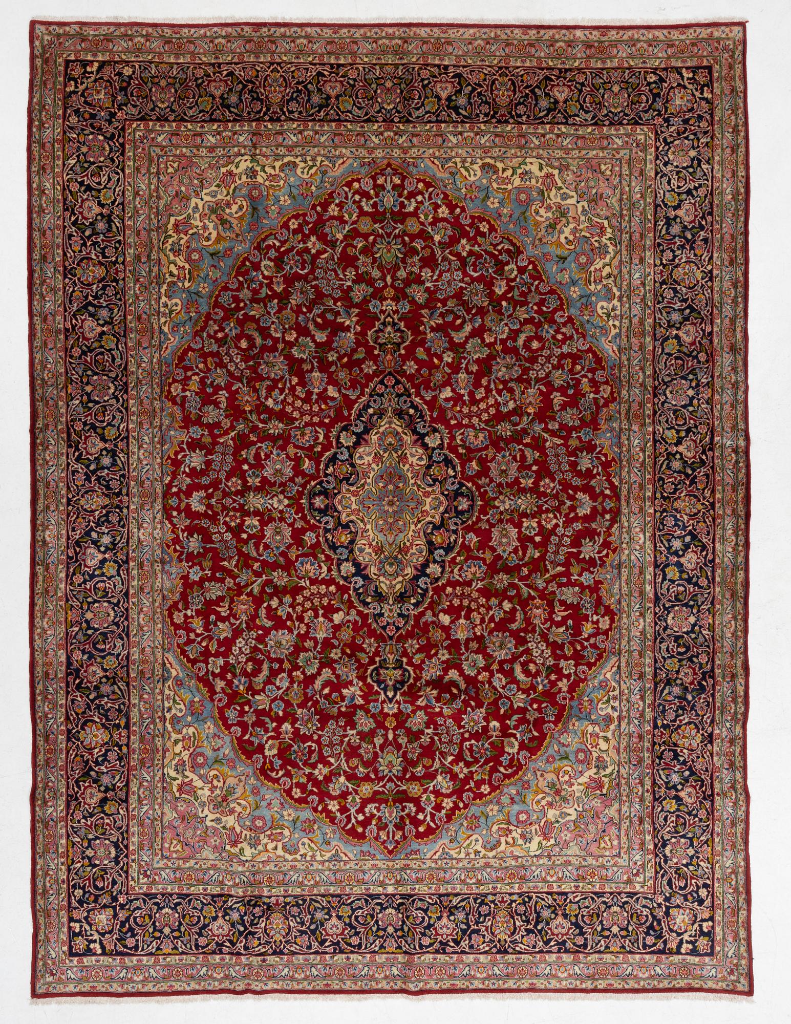 A carpet, semi-antique Kirman, signed, circa 400 x 300 cm.