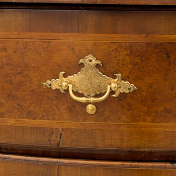 A 1700s chest of drawers.