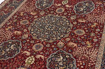 A semi-antique Benlian Tabriz carpet, signed Jabarzade, c. 416 x 308 cm.