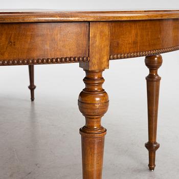 A dining table, late 19th Century.
