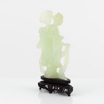 A Chinese stone scultpure of an elgegant lady, 20th Century.
