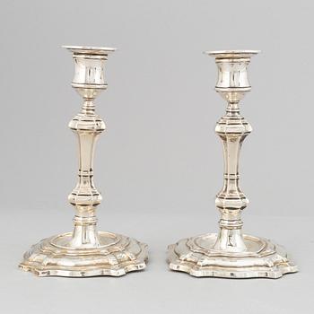A pair of silver candlesticks, mark of William Hutton & Sons Ltd, London 1900.