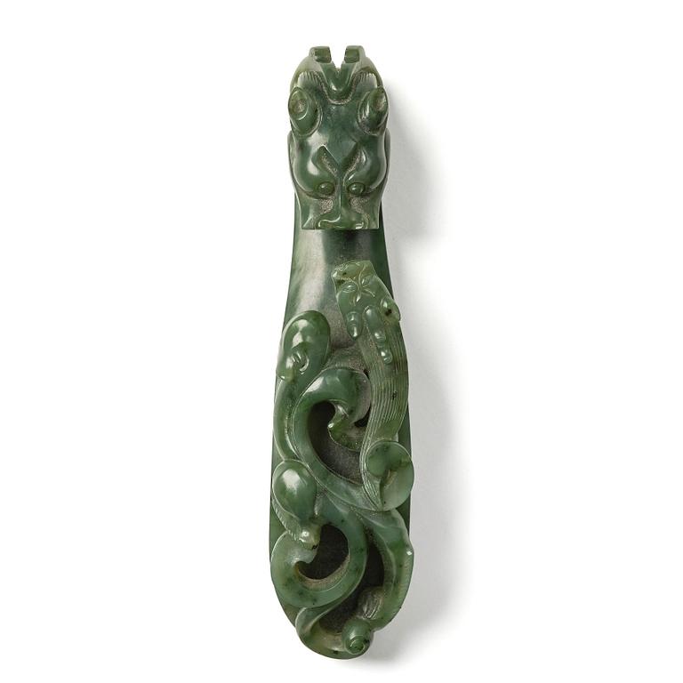 A nephrite belt hook, China, early 20th Century or older.