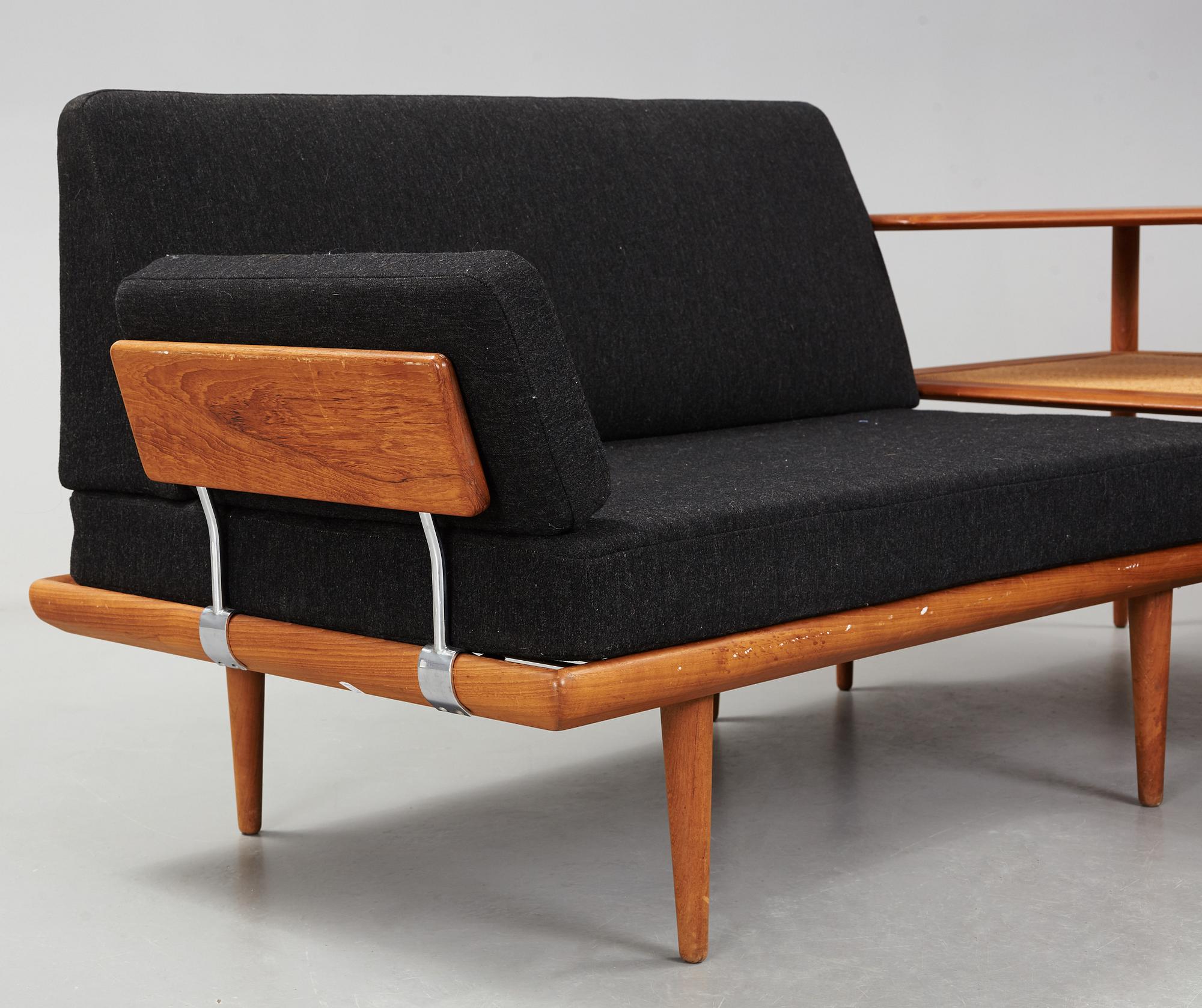 A set of two Danish 'Minerva' sofas with a table for France & Daverkosen.