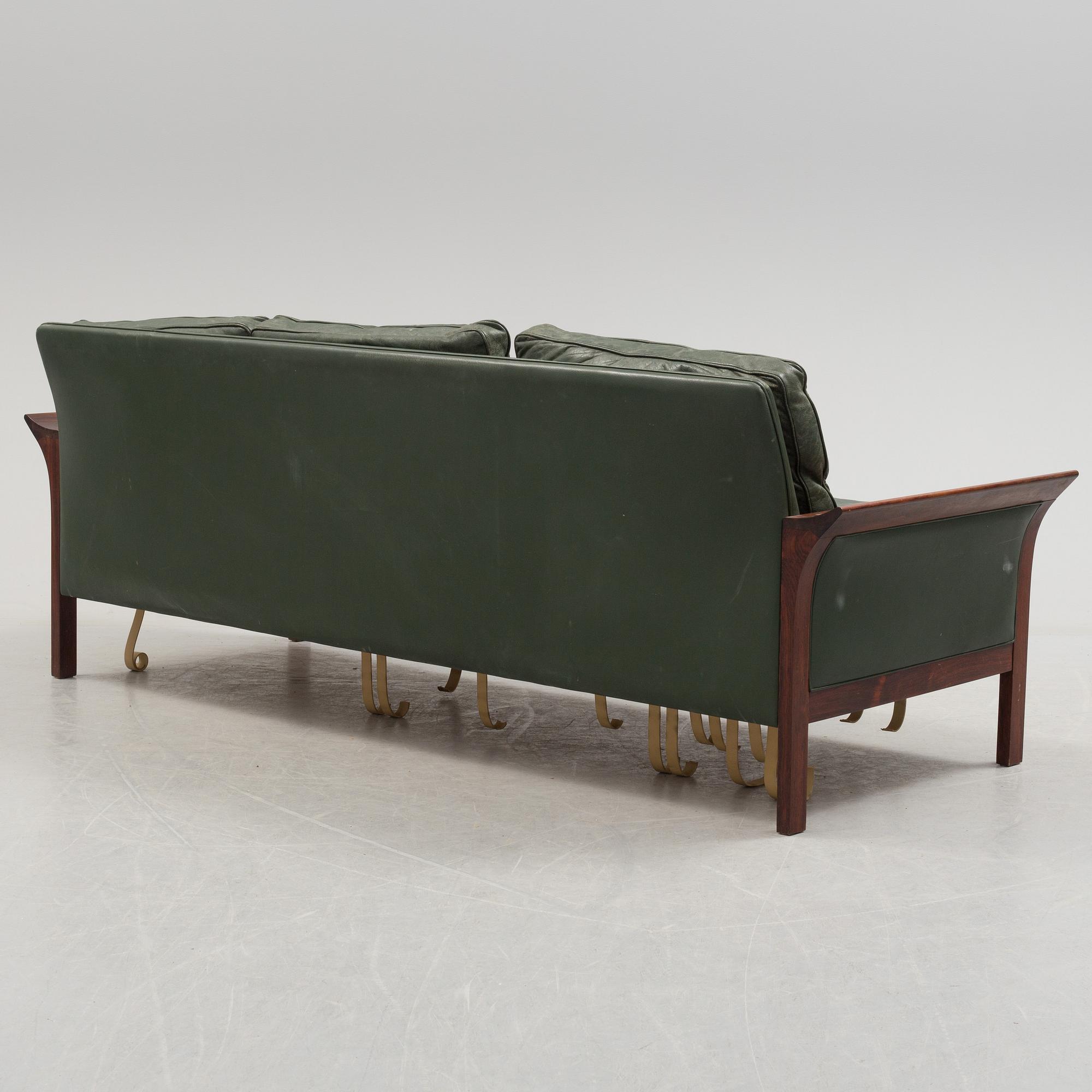 A 1960's Danish sofa, with 2 easy chairs and 2 tables by Glostrup.