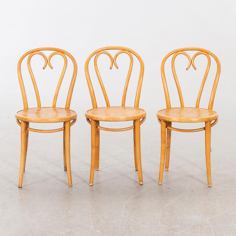 A SET OF SIX BENTWOOD CHAIRS.