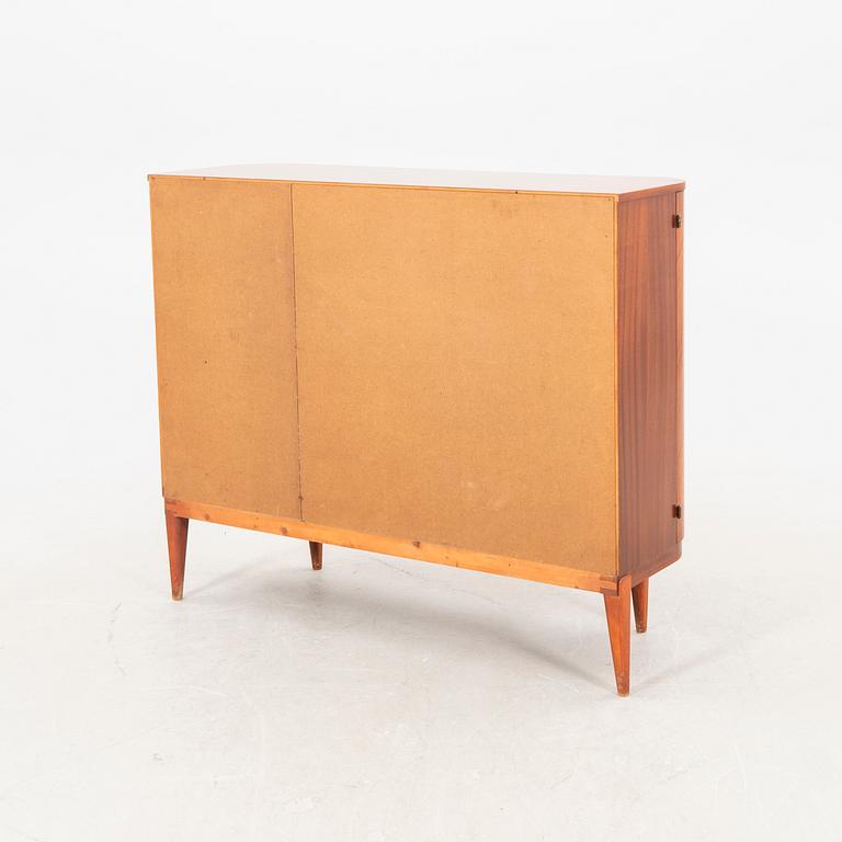 A 1940s teak and mahogany sideboard/cabinet.