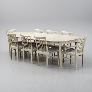 A dining table with two armchairs and six chairs by Carl Malmsten for Bodafors.