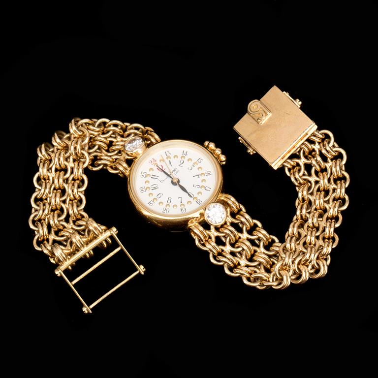ARMBANDSUR, 18K guld med briljantslipade diamanter ca 0,60ct, Bernard Sylvain, Paris. Vikt ca 56g.