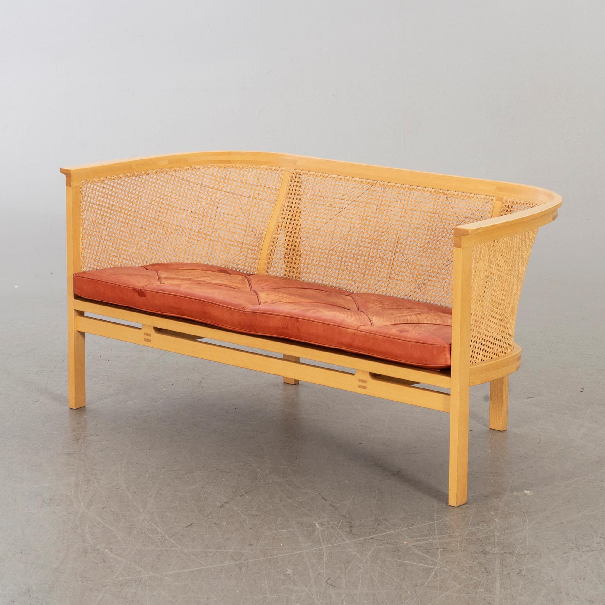 A sofa and an armchair in "Kongeserien" by Rud Thygesen & Johnny Sörensen. Designed in 1968.