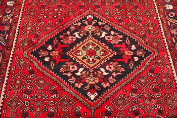 A Hamadan carpet, c. 299 x 159 cm.