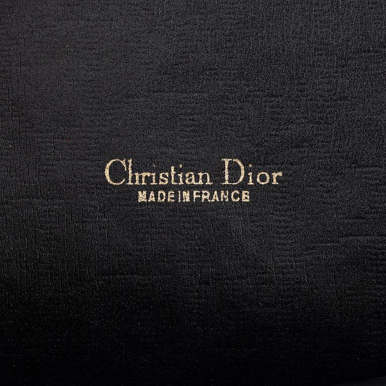 Christian Dior, a logo canvas bag.