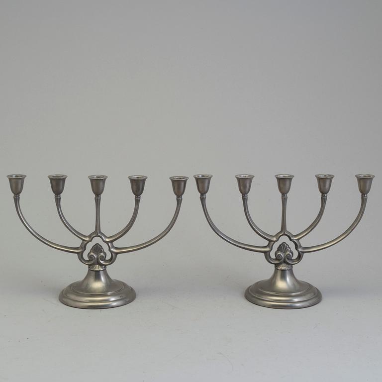A pair of pewter candelabra from GAB, first half of the 20th century.
