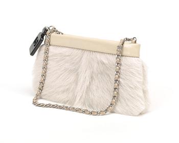 An rabbit fur evening bag by Chanel.